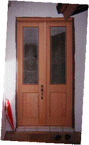 front view of custom doors built by R. W. Almonte Enterprises, Inc.
The doors incorporate etched glass from an old church in Puerto Rico.